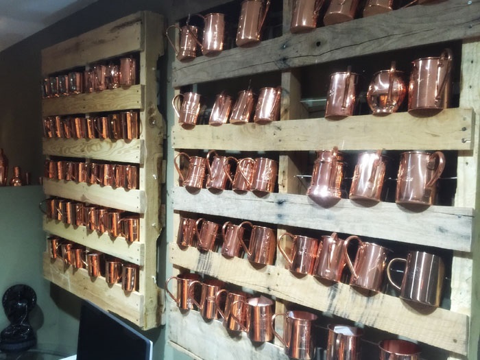 Wall of Copper Mugs